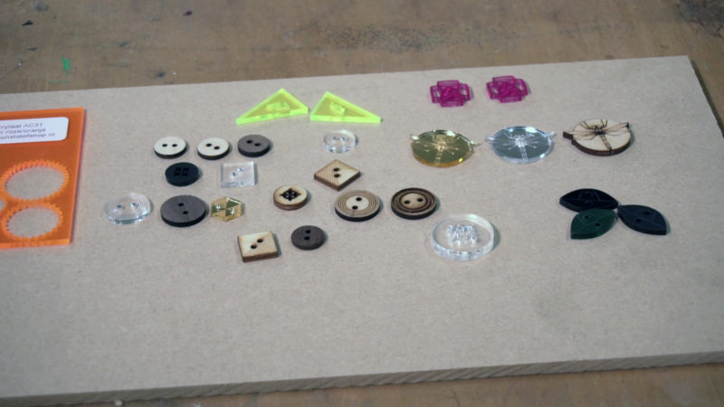 Different kinds of lasered buttons.