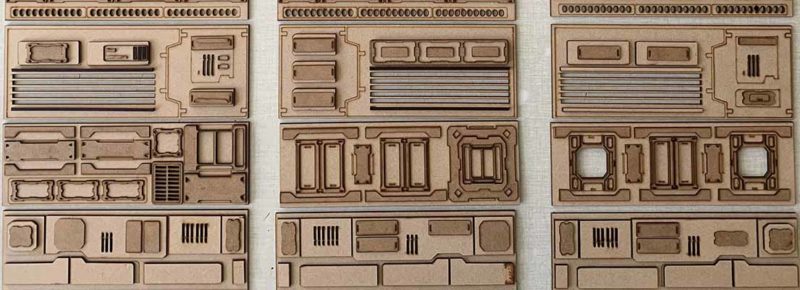 Laser cut parts used for the decor of a spaceship created by A Small Gang.